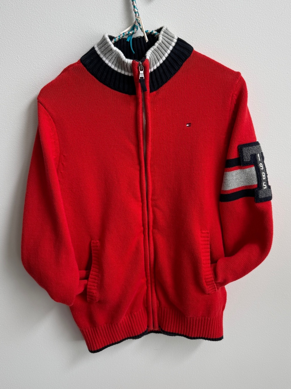 Tommy Hilfiger zip up knot sweater 
Fits as a small IMO